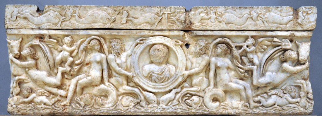 Roman child’s sarcophagus with unfinished clipeus portrait amidst marine creatures. First half of third century AD. Rome, Vatican Museums (inv. 2312).