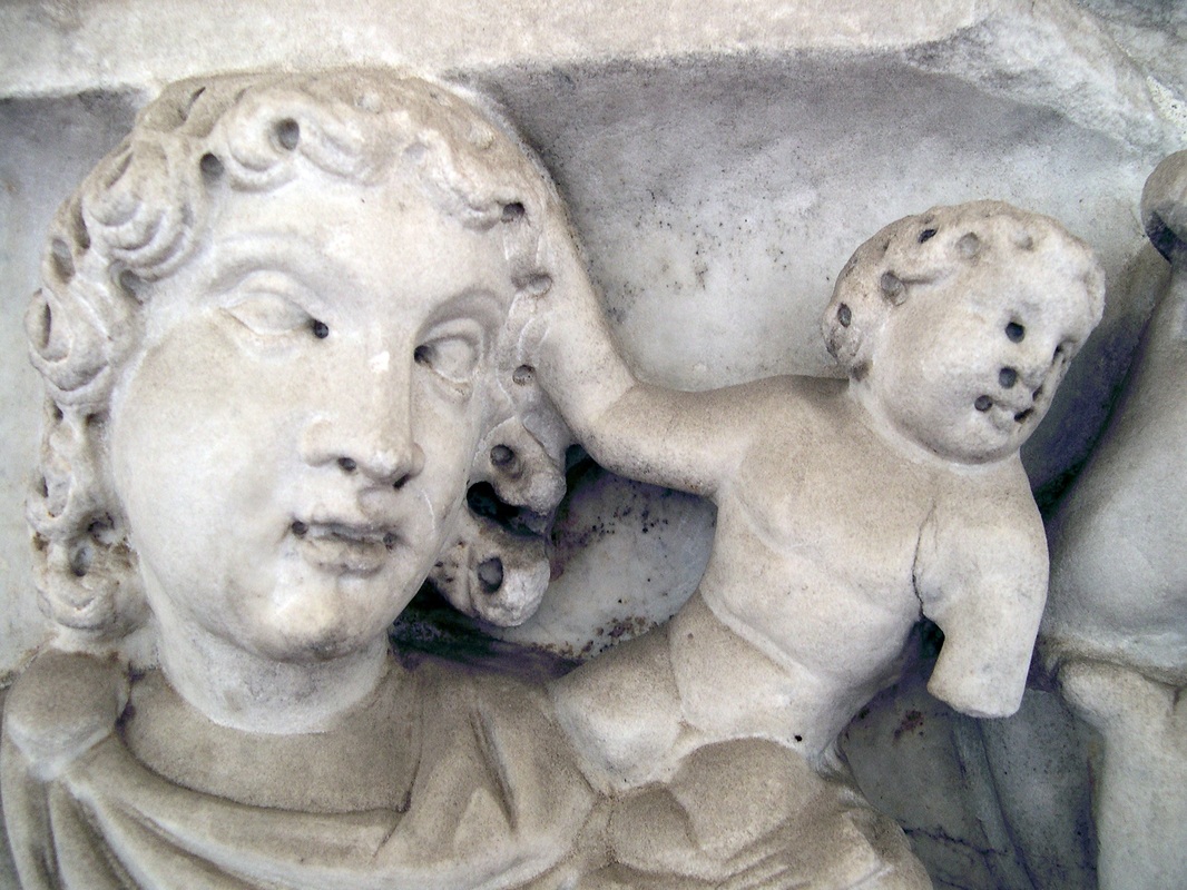 Detail of a Roman sarcophagus featuring a drunk Dionysus flanked by personifications of the four seasons. Ca. 320-335 AD. Rome, Baths of Diocletian (inv. 407).