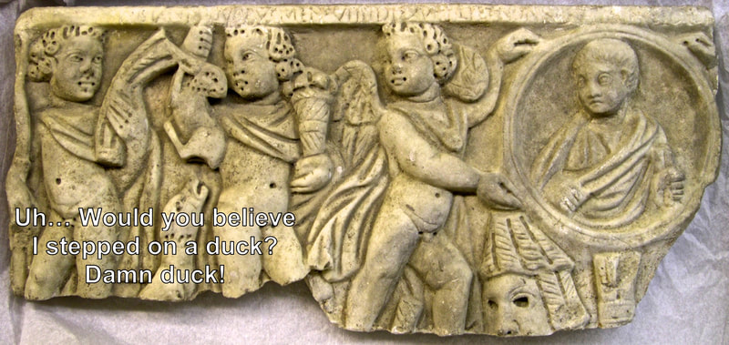 Fragment of a child’s sarcophagus with Seasons and a Cupid holding the portrait of the deceased boy.
Ca. 300 AD.  Hearst Museum, Berkeley.
Meme by Robert Wall.